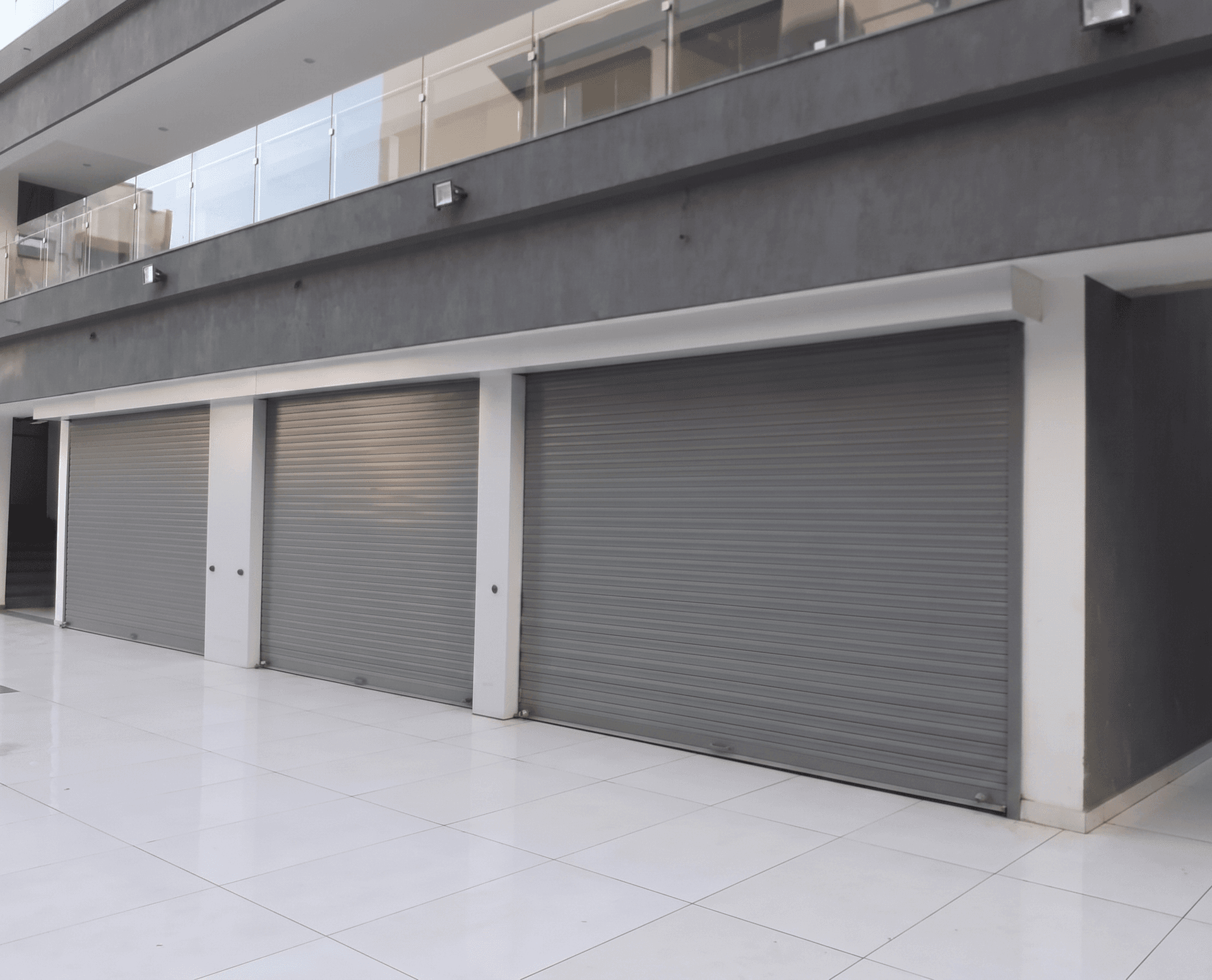 high speed PVC fabric roll up doors in a food processing facility with clean white walls and industrial lighting